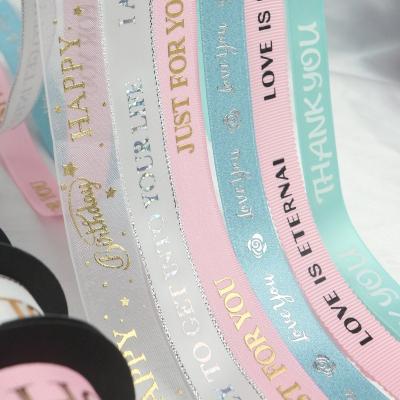 China Custom Clear Printed Logo Huihuang Ribbons Factory OEM brand gift package cake decoration printed ribbon with logo for sale