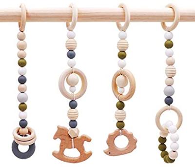 China 2020 Soft Hot Sales Amazon Beech Wooden Toy Baby Gym Teething Toys With Clip for sale