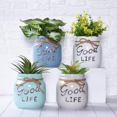 China Wholesale Minimalist American Wide Mouth Vase GOOD LIFE Art Style Plant Living Room Home Decoration Embossed Plant Ceramic Flower Pots for sale