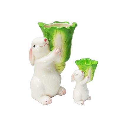 China Viable Wholesale Easter Decor Ceramic Egg Cup Alone With Rabbit Stand Holder for sale