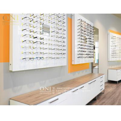 China Durable High End Eyewear Shop Interior Design Optical Shop Design Furniture To Compliant Shop Roll Out for sale