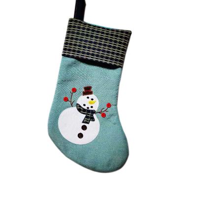 China Direct Selling Cozy Christmas Stocking Stuffer Gift Bag Snowman Printing Candy Gift Bag Christmas Party Decorations for sale