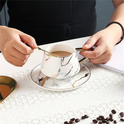 China New Design Sustainable Luxury Gold Marble Handle Ceramic Coffee Mug With Saucer for sale