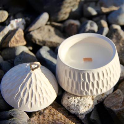 China Home Decor Unique Design Embossed Nordic Wedding Wholesale White Ceramic Decor Candle Jars With Lid for sale