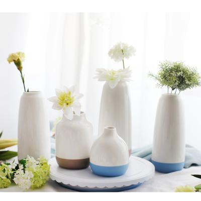 China Modern Home Decoration Modern Tabletop Porcelain Cheap White Flower Vase With Color Base for sale