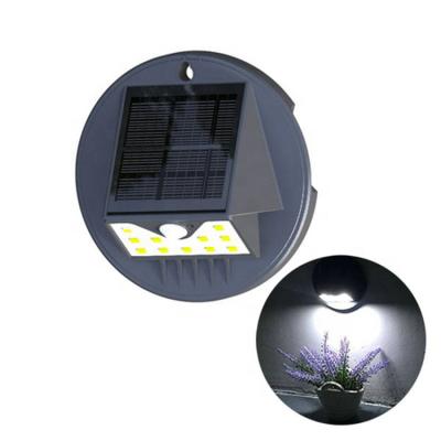 China IP65 Waterproof Garden Wall Light PIR Motion Sensor Solar LED Solar Decorative Wall Mount Lights for sale