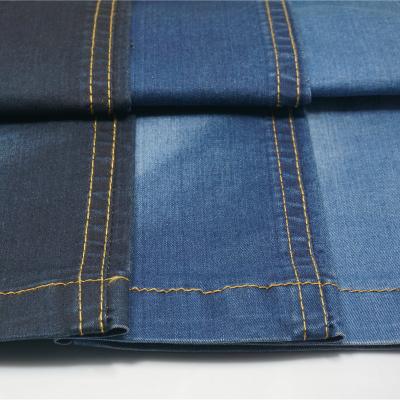 China Thermo Bulk Denim Fabric 4X1 10-11Oz Silky Cotton Handbags Tear-resistant 15 oz bulk denim fabric for pants for sale