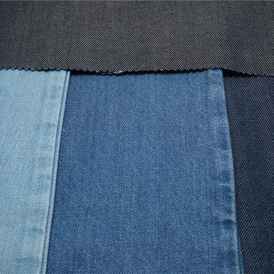 China Tear-Resistant Dark Bule Midweight Denim Fabric Cost Per Yard No Spandex Twill Jeans Without Midweight Denim Fabric for sale