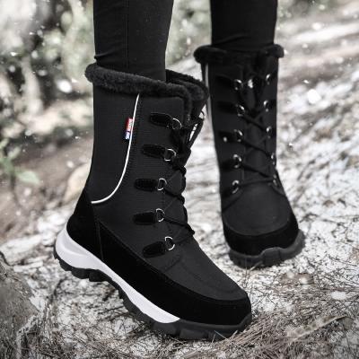 China Fashion Trend Drop Boots Good Quality Winter Fur High Top Outdoor Genuine Leather Outdoor Snow Boots For Women for sale