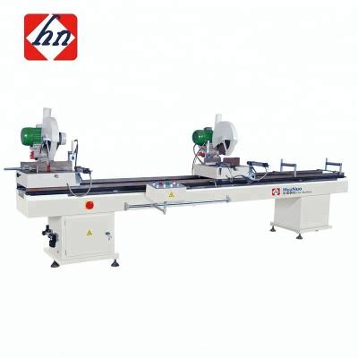 China Advanced machinery repair shops and high efficient u PVC and aluminum profile making window door machinery double head cut saw for sale