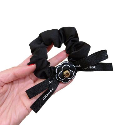 China Female Curly Hair Small Temperament Large Intestine Hair Ring Camellia Bow Hair Rope Fresh High Quality Main Ring Rope for sale