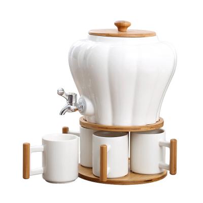 China Pastoral porcelain water dispenser with wooden stand, ceramic lid and stainless steel spit with wooden lid with tray set for sale