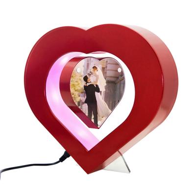 China Global Magnetic Levitation Photo Frame Heart Shaped Decor Opens Gift Decoration Craft Electric Items for sale