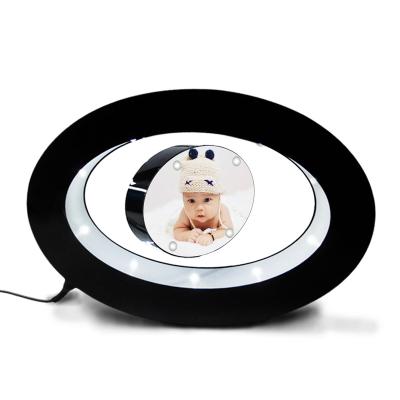 China Global Hot Selling Magnetic Levitation Photo Frame Oval Gifts Crafts Home Decorative for sale