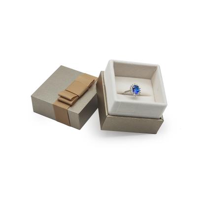 China Custom Jewelry Box Jewelry Storage Products Ring Packaging Box Ring Earring Best Selling Jewelry Box With Ribbon for sale