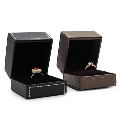 China With Decorative Stitching Lines Black Leather Double Ring Packaging Box Mini Jewelry Box Double Ring Gift Box For Diamond Ring for sale