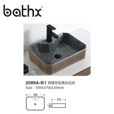 China Modern Design Ceramic Basin Sanitary White Artistic Wash Ware New Basin For Decoration for sale