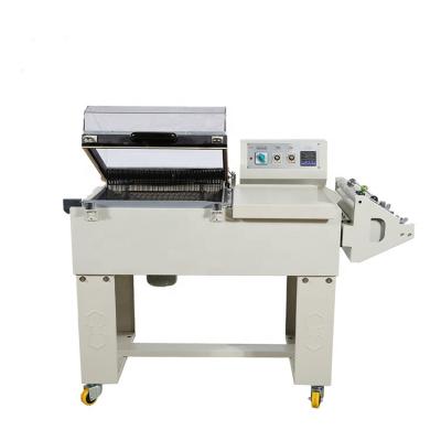 China Food Manual L Type Perfume Bottle Heat Shrink Wrap Wrapping Machine With Free Spare Part for sale