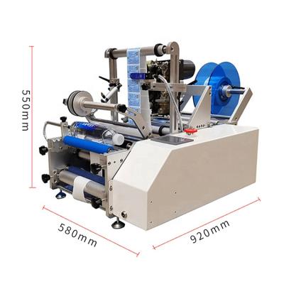 China Food Factory Semi Automatic Cans Adhesive Sticker Labeling Machine For Round Bottles for sale