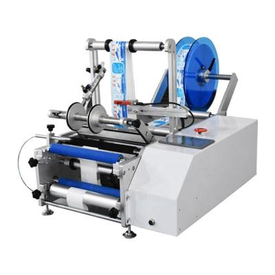 China Semi Automatic Food Round Tube Plastic Bottle Beer Can Wine Water Labeling Machine for sale