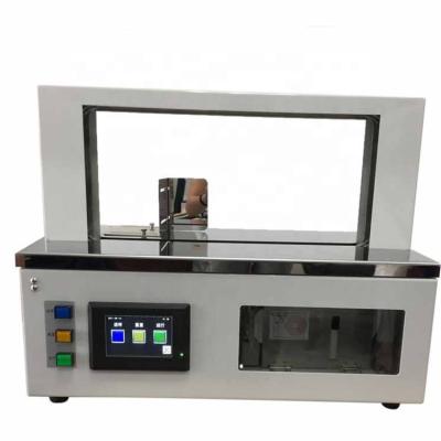 China Automatic Electric Food Silver Opp Film Paper Binding Tying Tape Machine for sale