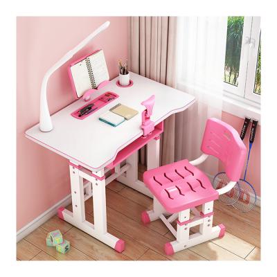 China Modern Height Adjustable Ergonomic Wooden Kids Desk Pink Kids Study Table And Chair for sale