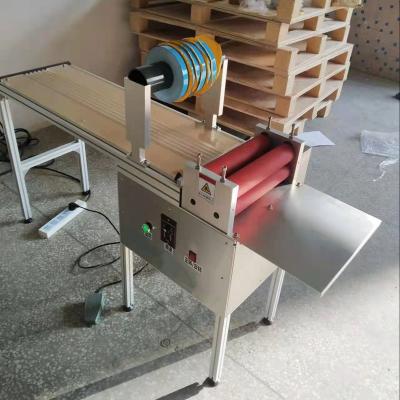 China Products Semi - Automatic Teardrop Adhesive Double Sided Tape Applicator Machine For LED Strip for sale