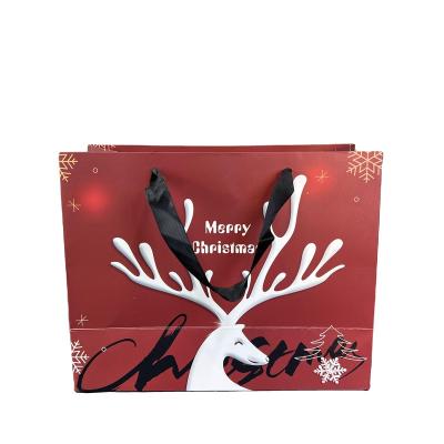 China 100% Eco-friendly Special Christmas Gift Paper Bag Atmosphere Thickened Party Festive Bags for sale