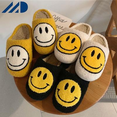 China Cute Pattern Women's Fashion Trend Winter Bedroom Girls Fur Slippers Fluffy Smile Slippers Warm Female Cotton Plush Bedroom Ladies Shoes for sale