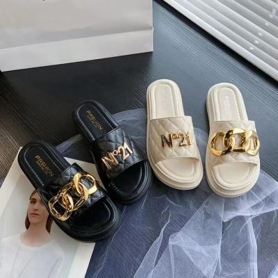 China Personalized Unique Thick Slippers Woman Non Slip Wedge Flat Fashion Design Metal Clasp Sandals for sale