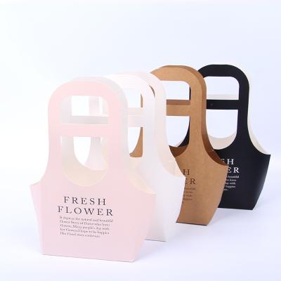 China Custom Recycled Materials Logo Flower Paper Bag Portable Gift Package Bag Take Away Kraft Paper Flower Bag For Flower Packaging for sale