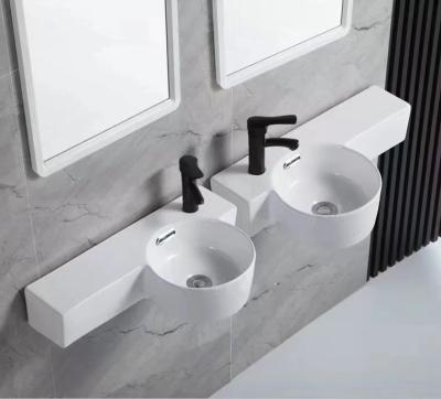 China Modern Home Modern White Ceramic Wall Hung Wash Bathroom Sink Basin for sale