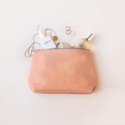 China Custom Pebble Logo Ladies Leather Zipper Cosmetic Bag Leather Clutch Bag Women for sale