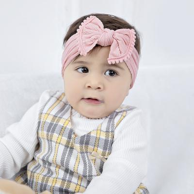 China Casual Nylon Hair Bow Hairbands Headbands Hair Bands for Newborn Infant Kids Babies Toddlers with Small Tassel Pompom for sale