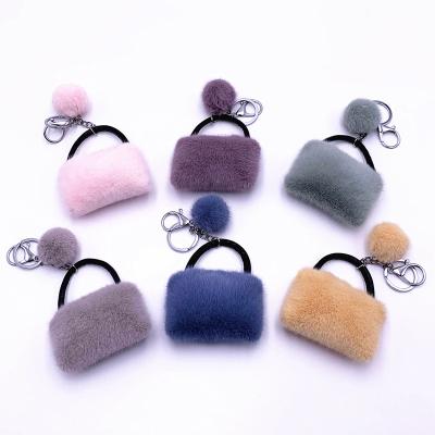 China Lovely Mini Plush Casual Purse Bag Design Key Chain Pendant For Girls for sale