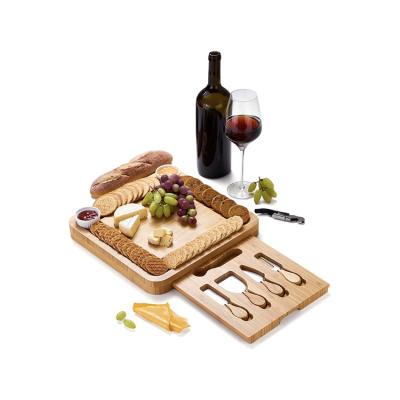 China Sustainable Factory Wholesale Custom Food Serving Dish 13 Inch Bamboo Cheese Charcuterie Boards With Knives for sale