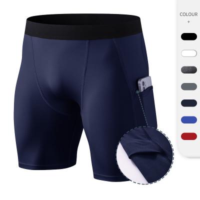 China QUICK DRY Fitness Men Compression Shorts Gym Sporting Tight Bodybuilding Shorts With Pockets for sale