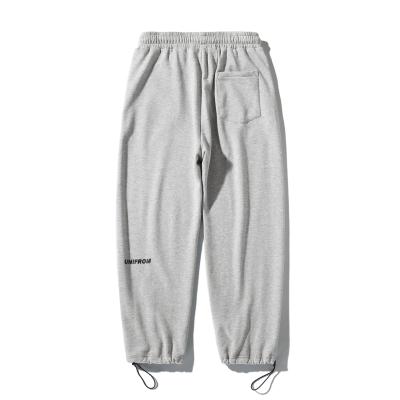 China Anti-Wrinkle Well Rated New China Supplier Solid Color Loose Mens Sweatpants College Personality Casual Pants for sale