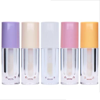 China Cosmetics Wholesale Matte Finish Lip Gloss Bottle Cosmetic Transparent Lip Gloss Tube With Candy Color Cover for sale