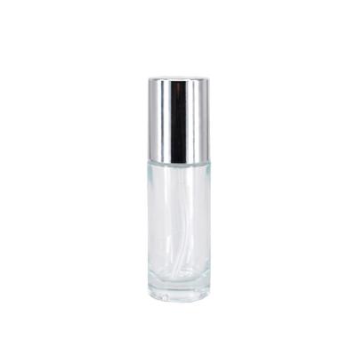 China Hot Selling Cosmetics Cylinder Shape Bottle 30ml/50ml Concealer Base Glass Cosmetic Bottle With Press Pump for sale