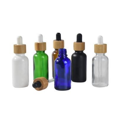 China Personal Care 30ml Cover Glass Wooden Bamboo Bottle With Bamboo Dropper Cap for sale