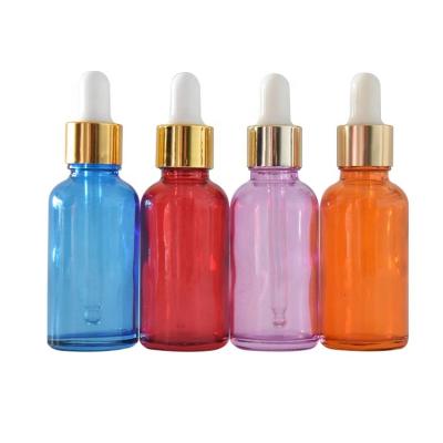 China Unique Red Personal Care Pill Essential Oil Glass Bottle Glass Dropper for sale