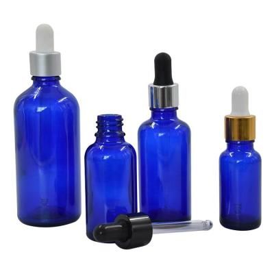 China Luxury Essential Oil Blue Bottle Glass Personal Care Dropper Bottle Glass Dropper Bottle for sale