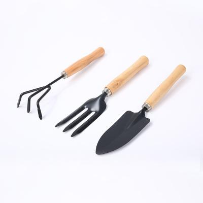 China Custom Children's Wooden Handle Gardening Planting Tool Kit 3 Pieces Toy Planting Tool Kit for sale