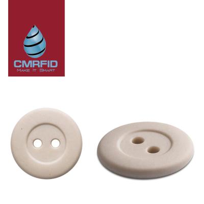 China Indentify 13.56 MHz iso15693 waterproof washable tags 2 holes button rfid UHF laundry tag for sale