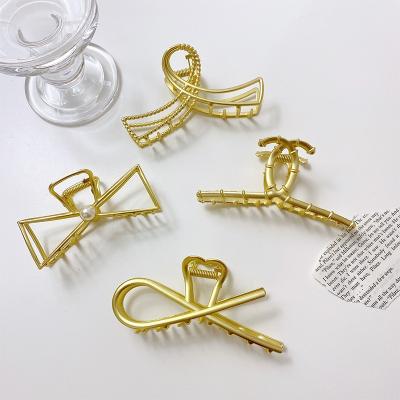 China High quality and fast delivery 2021 Ladies Bowknot Large Gold Hair Clip Hairpins wholesale custom metal hair claw barrette ribbon for sale