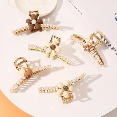 China High quality and fast clean delivery hot factory sales metal hair claw retro flower shark hair claw clips headdress for sale