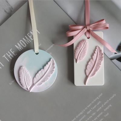 China Viable small creative feather plaster silicone mold for candle holder for sale