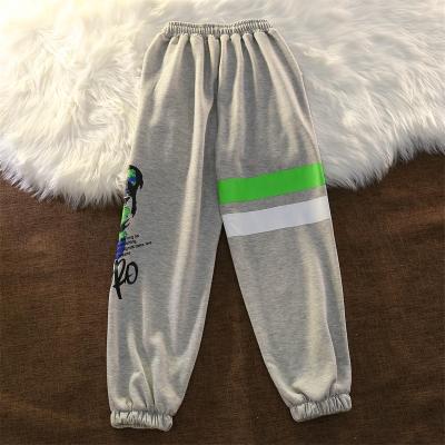 China New anti-static fashion sports pants in autumn and winter are thin, loose, casual men and women's guard pants and gaiters for sale