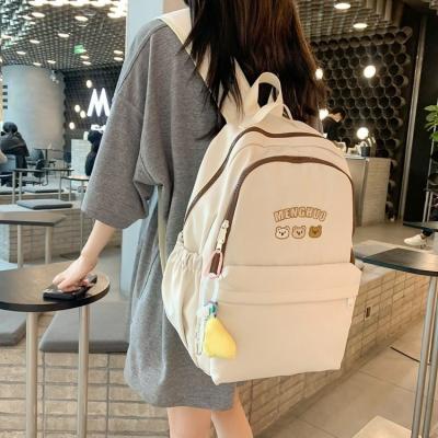 China New fashion cute waterproof female college students high school backpack CIA large capacity schoolbag simple waterproof backpack for sale